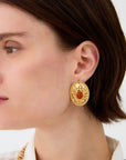 Orecchini Amelia martellati con pietra arancio
