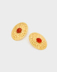 Orecchini Amelia martellati con pietra arancio